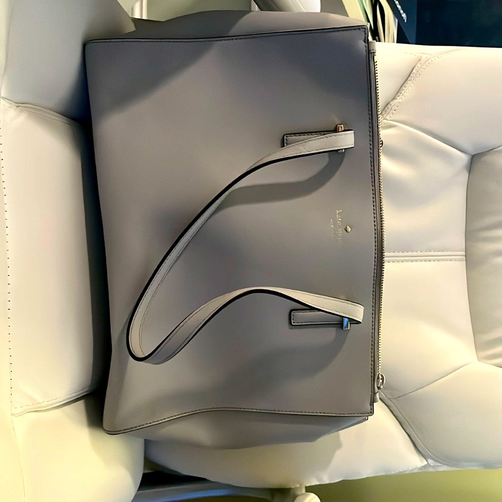 Kate spade bag with 3 divided sections. 14”x 10”